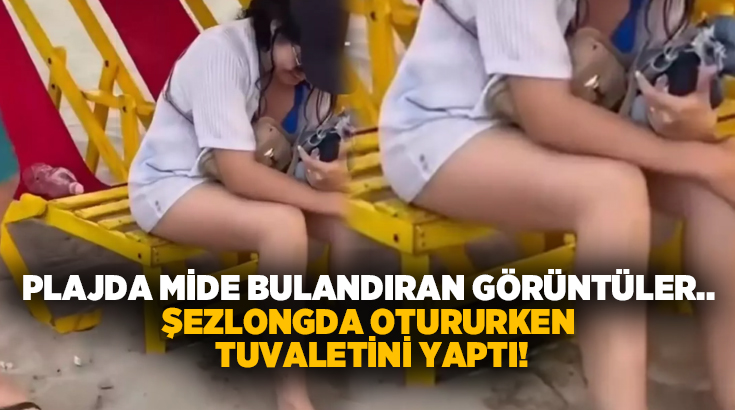 Plajda mide bulandıran görüntüler.. Şezlongda otururken tuvaletini yaptı!