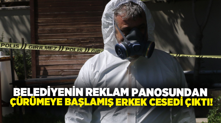 Belediyenin reklam panosundan çürümeye başlamış erkek cesedi çıktı!